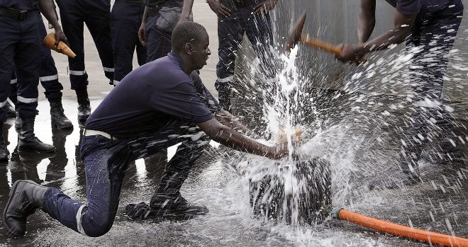 Firemen fixing a leak