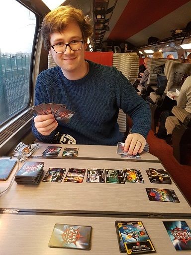 I am on a train playing a card game